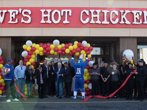 Dave's Hot Chicken Grand Opening - Executive Team and Employees with Mascots