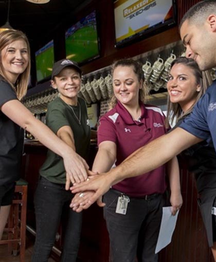 Work at The Greene Turtle - Handshake